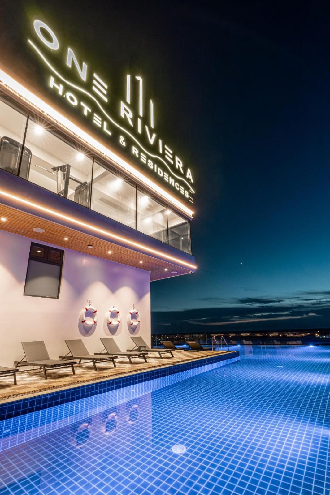 One Riviera Hotel And Residences Ban Souanmone Экстерьер фото